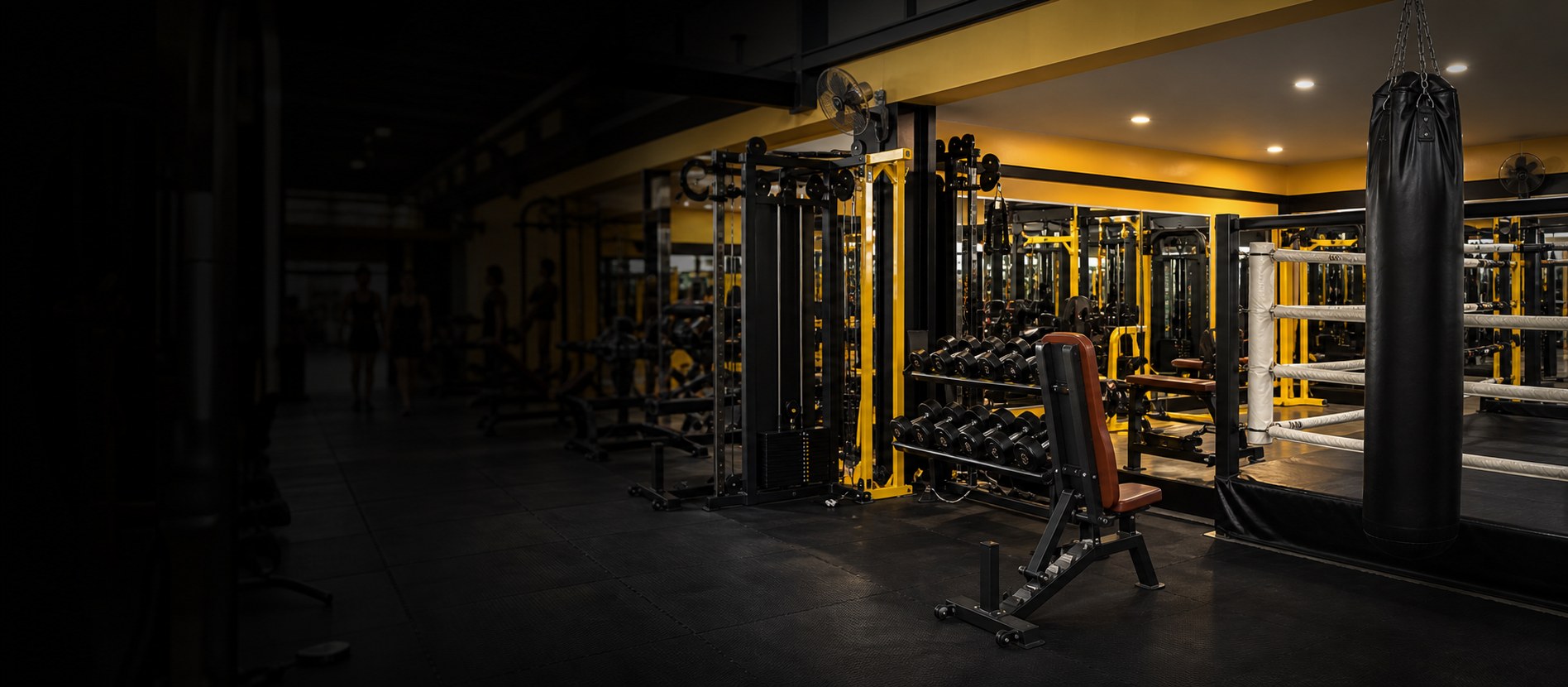 Industrial gym with weight machines and training equipment